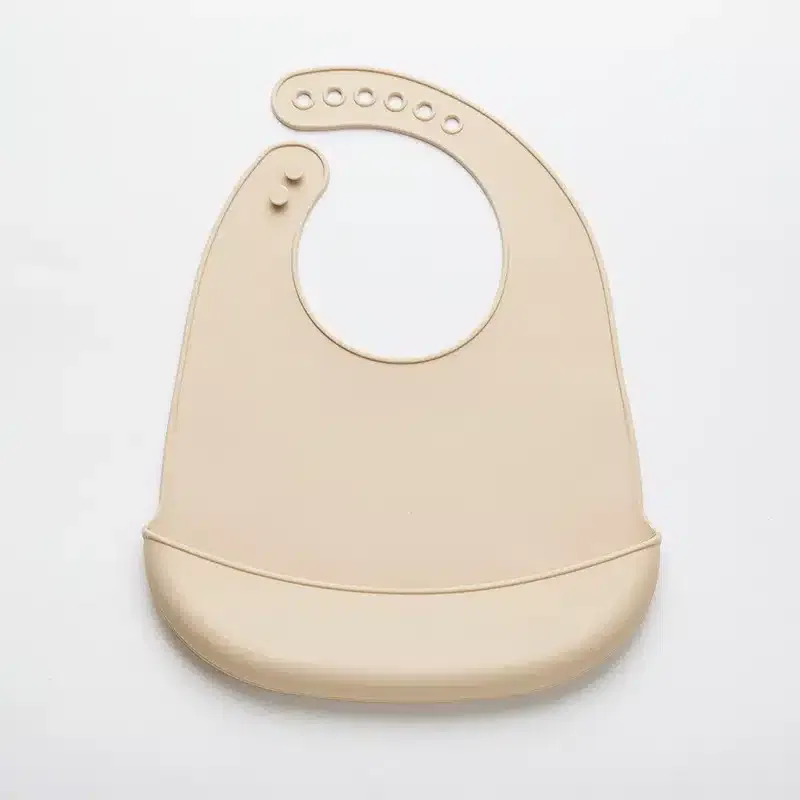 Yummy Bavoir en Silicone avec Poche 9m+ beige