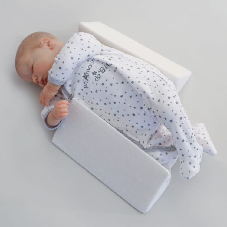Trois Kilos Sept Cale-bébé latéral et dorsal